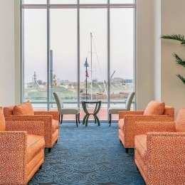 a room with orange chairs