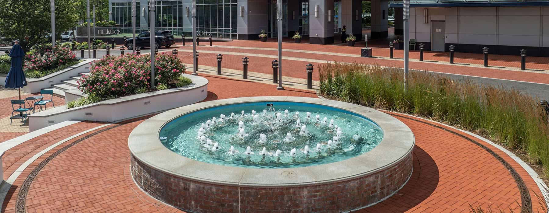 a water fountain in front of a building